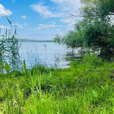 Ferienhaeuser Mit Seeblick Direkt Am Plauer *